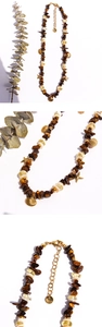 Vue détaillée des pierres d'oeil de tigre, perles citrine et pendentifs d'étoile de mer