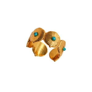 Bague ajustable dorée vintage avec pierres turquoise et texture soleil radiale