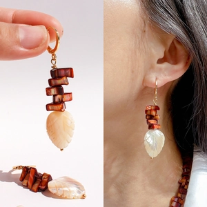 Handmade shell leaf drop earrings with deep red beads and gold-tone hooks for women