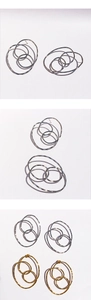 Détails des créoles géométriques ovales minimalistes en finitions or et argent