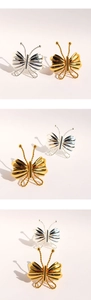 Détails de bagues papillon 3D dorées et argentées avec texture d'ailes plissées métalliques