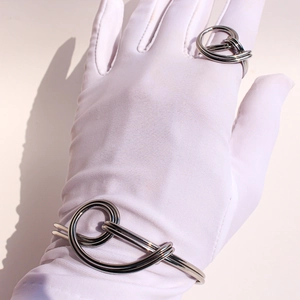 Silver twisted knot open cuff bracelet and ring set in minimalist wire industrial style
