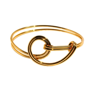 Polished gold double-layer knotted bangle with a minimalist intertwined metal wire design