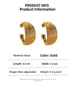 Detailed view of layered brushed gold brass hoop earrings with size and weight info