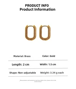 Detail showing dimensions and textured gold U-shaped brass earrings on white background