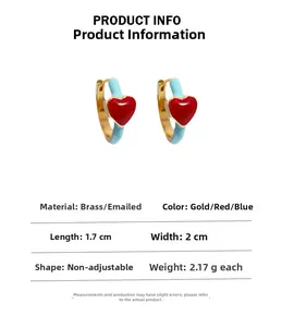 Detail showing blue enamel hoop earrings with red heart accent and brass measurements