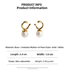 Detailed view showing dimensions and weight of golden irregular geometric pearl earrings