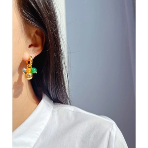 Bohemian gold hoop earrings with multi-colored agate beads and a polished metal ball