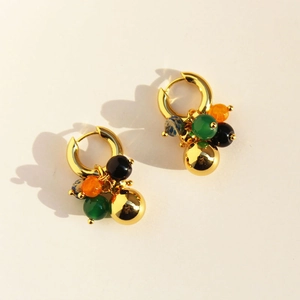 Bohemian gold hoop earrings with colorful green, black, and orange agate beads