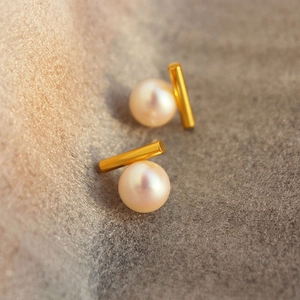 Minimalist vintage pearl stud earrings with cylindrical gold accents for women