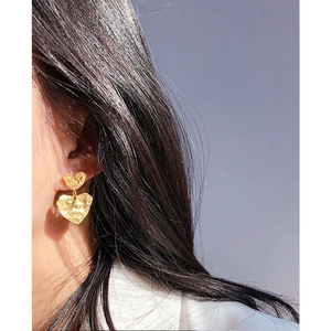 Minimalist gold hammered heart earrings for women with a textured foil finish