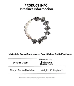 Detail of freshwater pearl and chunky brass chain bracelet with OT clasp and 20cm length