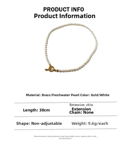 Detail of freshwater pearl necklace featuring a golden brass OT toggle clasp and 38cm chain