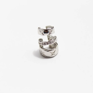 Three-layer silver ear cuff with micro-pave zircons and diamond lattice texture