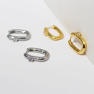 U-shaped brass gold and silver plated hoop earrings with sparkling cubic zirconia