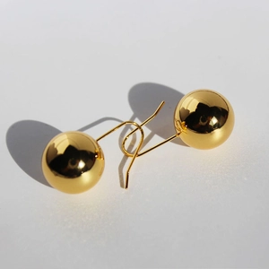 Minimalist glossy mirror-finish golden ball earrings with polished reflective surface
