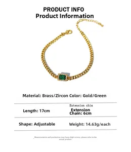 Close-up of gold-plated brass chain bracelet with emerald zircon and tiny white crystals