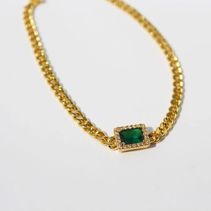 Gold-plated Cuban chain necklace with an emerald-cut green zircon pendant centerpiece