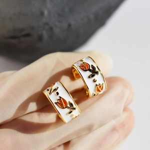 French vintage brass gold-plated hoop earrings with white enamel and tulip flower pattern