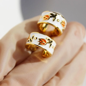 French vintage gold-plated C-shape earrings with white enamel and tulip flower pattern