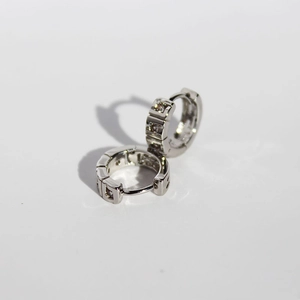 Minimalist silver huggie earrings with geometric square blocks and cubic zirconia inlay