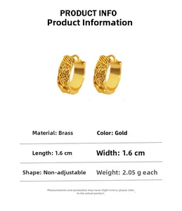 Detail view of vintage golden brass hoop earrings with embossed floral and leaf texture