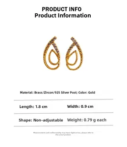 Macro detail showing leaf-shaped gold stud earring dimensions and zircon inlay details