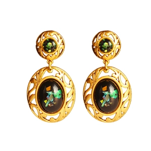 Vintage palace style hollow lace oval drop earrings with gold leaf and iridescent foil