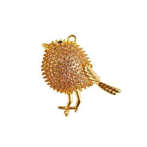 Exquisite gold bird brooch pendant with full pavé cubic zirconia and a black gem eye