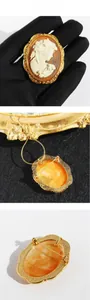 Detailed back view of vintage cameo brooch pendant with pin and hook mechanism