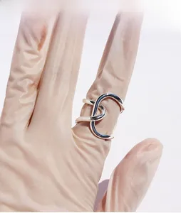 Detail presentation of silver minimalist irregular knotted adjustable ring for women and men