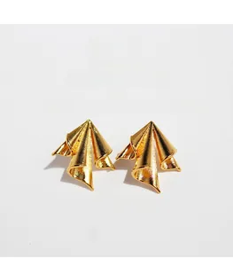 Detail view of gold-plated brass earrings featuring irregular pleated metal design with zircon