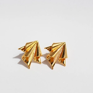 Irregular pleated gold airplane earrings with a vintage geometric brushed metal finish