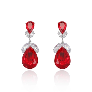 Elegant silver drop earrings featuring red pear-shaped gemstones and sparkling zircons