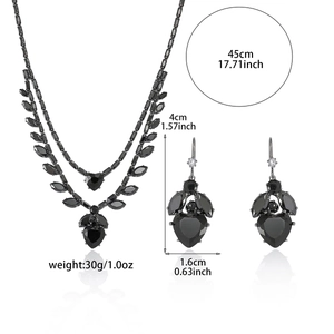 Elegant black heart jewelry set with necklace and earrings showing exact dimensions