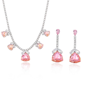 Pink zircon jewelry set including a silver-tone necklace and drop earrings on white base