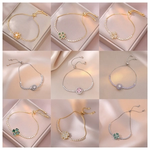 Adjustable tennis bracelet set with zircon pendants in gold and silver finishes