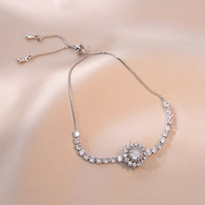 Detailed shot of an adjustable silver bracelet featuring a sunflower zircon centerpiece