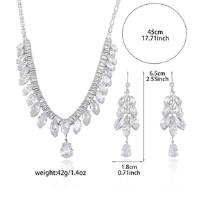 Silver zirconia necklace and earring set with pear-shaped tassels and wheat leaf design