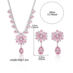 Pink zircon flower necklace and earrings set with silver-tone finish and polished reflections