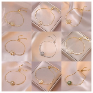 Bracciali floreali rotanti in zircone, finiture oro e argento, con chiusure regolabili