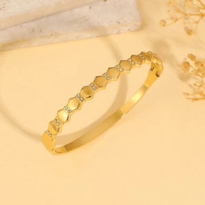 Golden titanium steel honeycomb bracelet with cubic zirconia and buckle closure