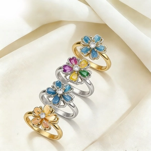Floral spinning rings with heart petals, blue cat eye and colorful zircon stones