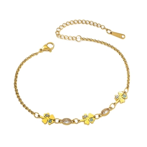 Bracelet trèfle en acier doré avec œil protecteur et zircons sur fond blanc