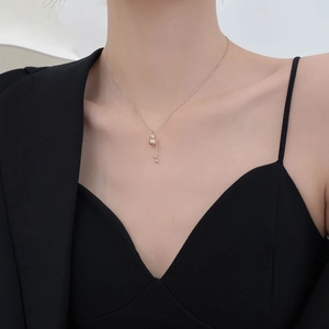 18K gold titanium steel necklace with elegant gourd pendant and tassel fringe on model