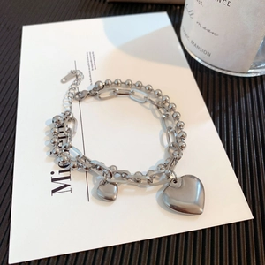 Double-layered titanium steel heart bracelet with bead and oval link chains in silver