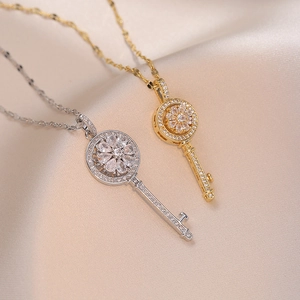 Collier Pendentif Clé Fleur Rotative en Acier Inoxydable Zircone Or Argent Bijoux de Mode Femme Pendentif Rotatif