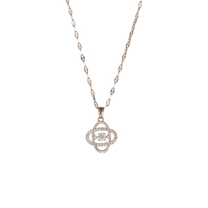 Collier trèfle en or rose avec pendentif cristal dansant et pierres pavées