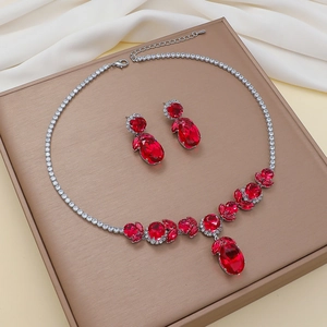 Zircon butterfly jewelry set with oval red stones and matching necklace earrings