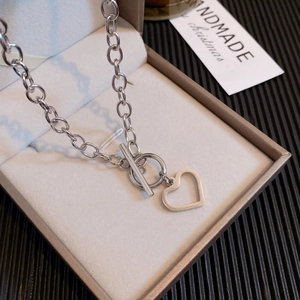 Minimalist silver titanium steel toggle necklace with a hollow heart pendant in a gift box